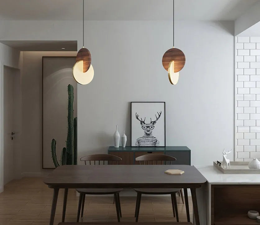 Long-line walnut wood chandelier with carved details and warm white LED lighting
