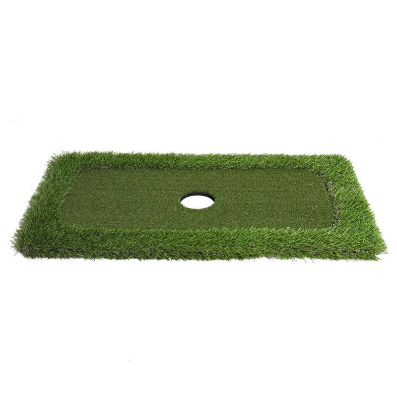 Green rectangular golf training mat on a flat surface, showing PP grass texture and EVA foam base.