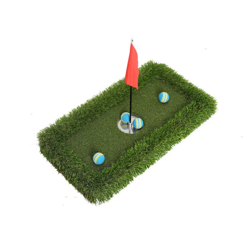 Green rectangular golf training mat on a flat surface, showing PP grass texture and EVA foam base.