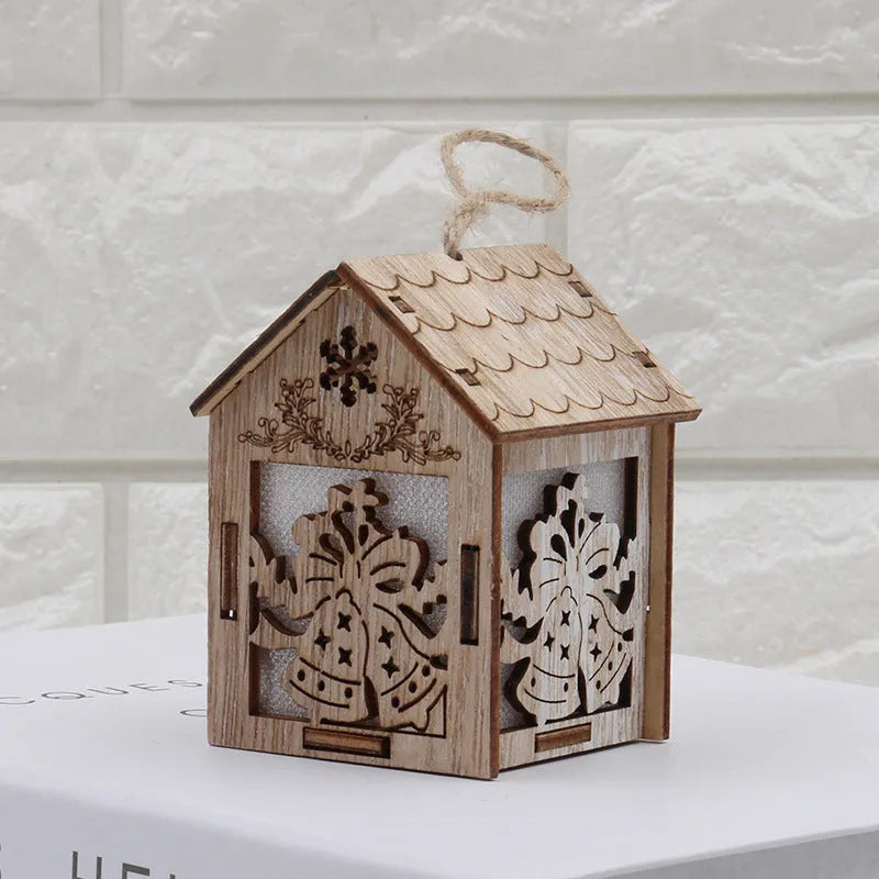 Natural wood Christmas decorations: small log bell and wooden houses with old man and snowman figures