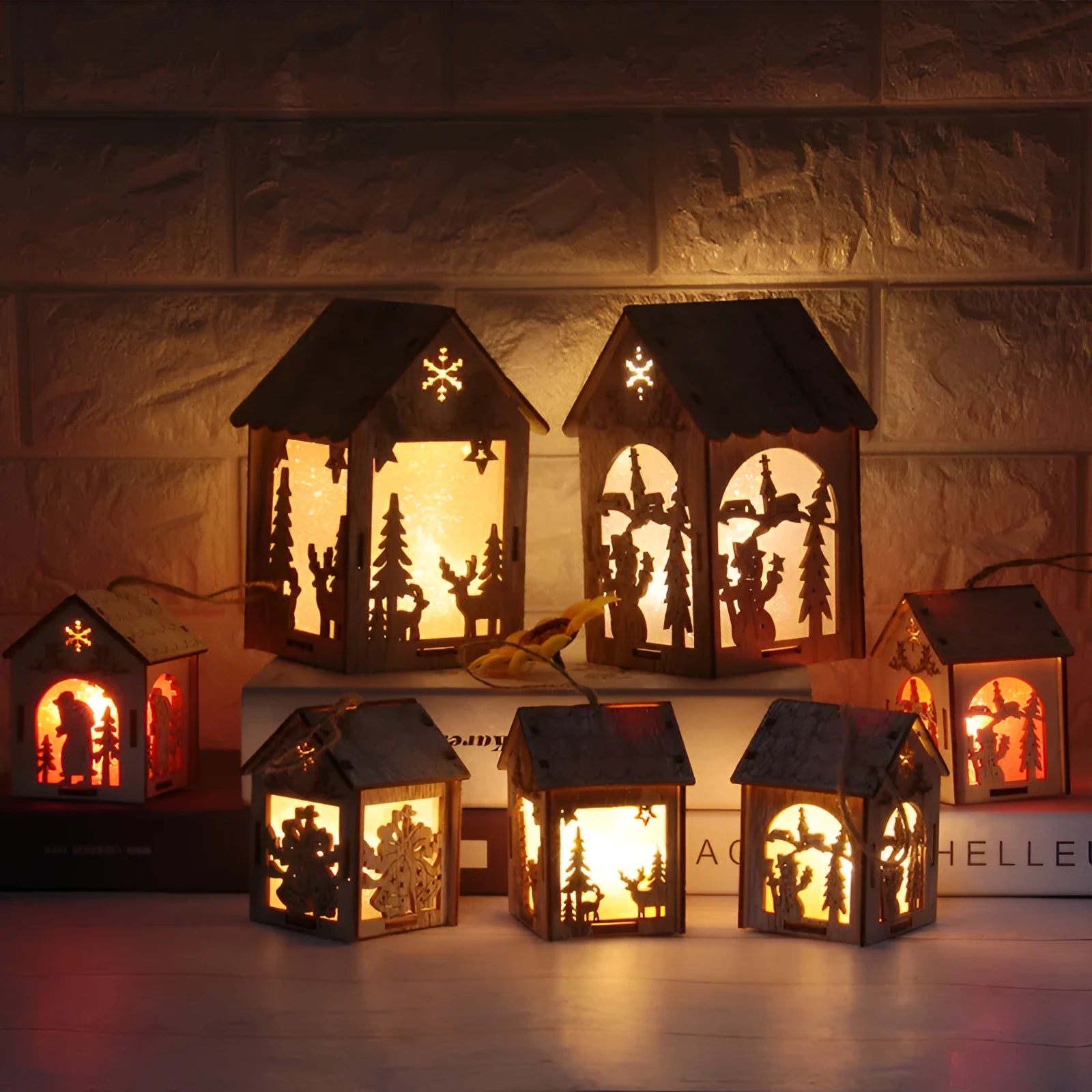 Natural wood Christmas decorations: small log bell and wooden houses with old man and snowman figures