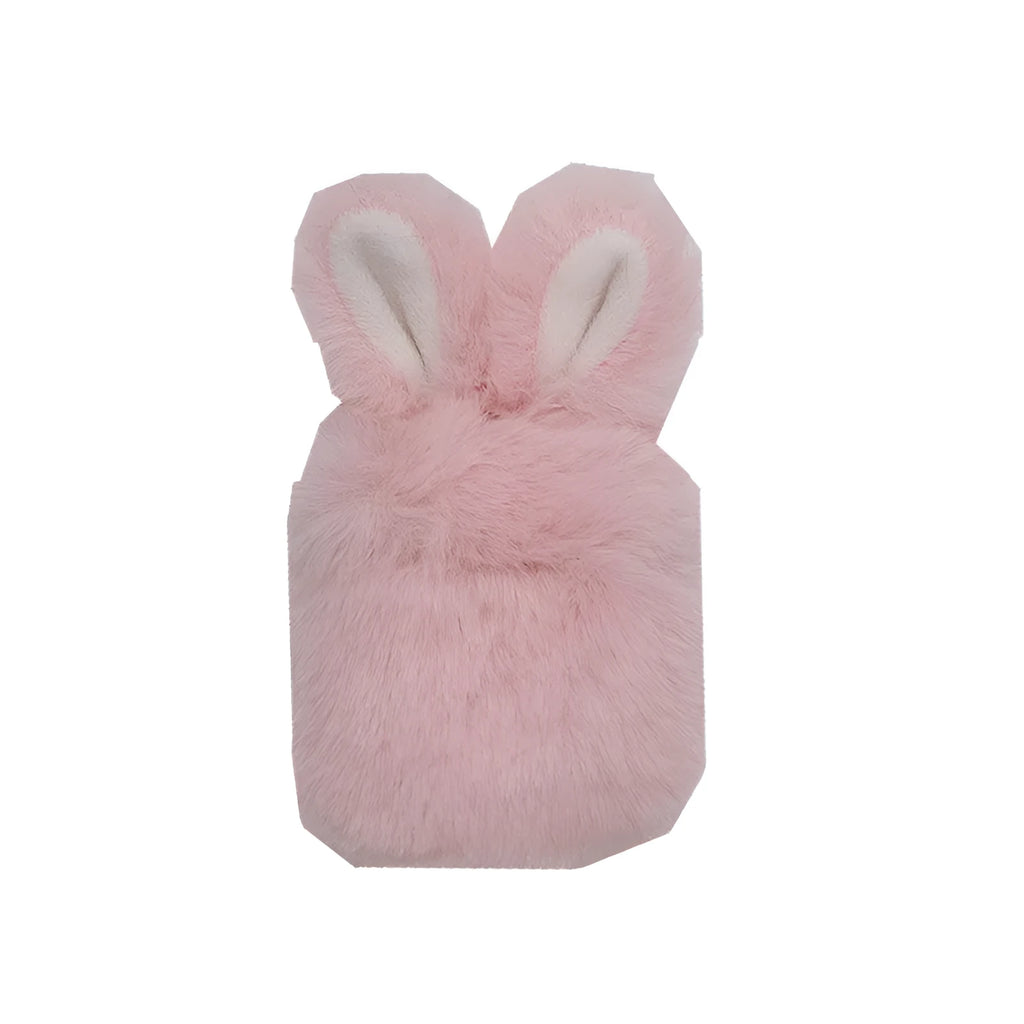 Plush pink silicone AirPods protective cover with cute raised rabbit ears on a white charging case.