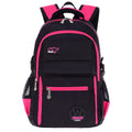 Waterproof nylon school backpack with side mesh pocket available in multiple colours for students