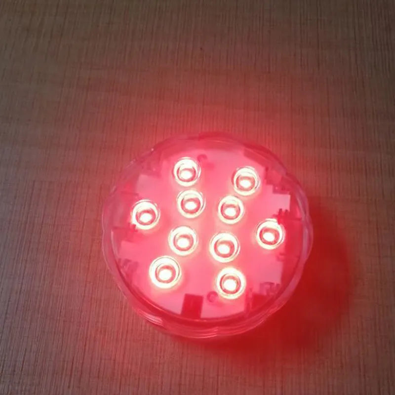 White submersible garden light with remote control for pools and water features