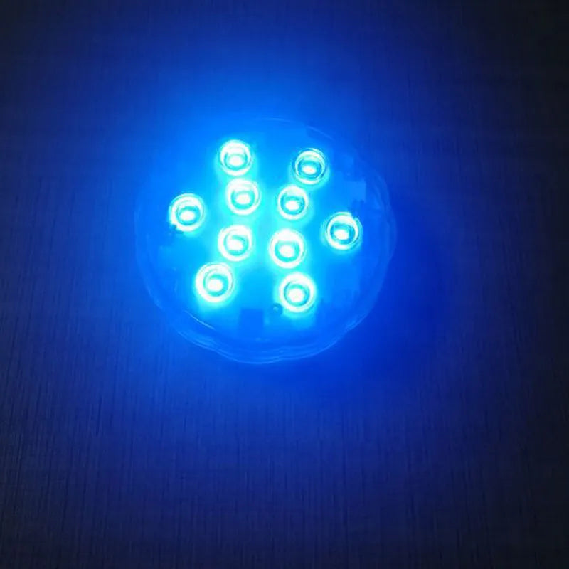 White submersible garden light with remote control for pools and water features