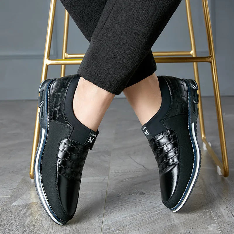 Men's large size casual leather shoes in blue, black, and brown colours with low-top design