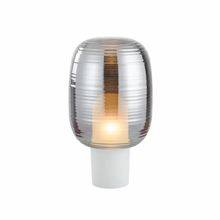 8029 glass table lamp in cognac colour with simple modern design and push button switch.
