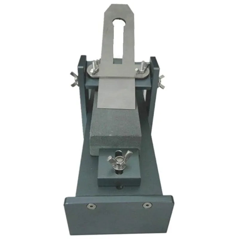 Fixed angle sharpening tool with gantry system for sharpening woodworking chisels and carving knives.