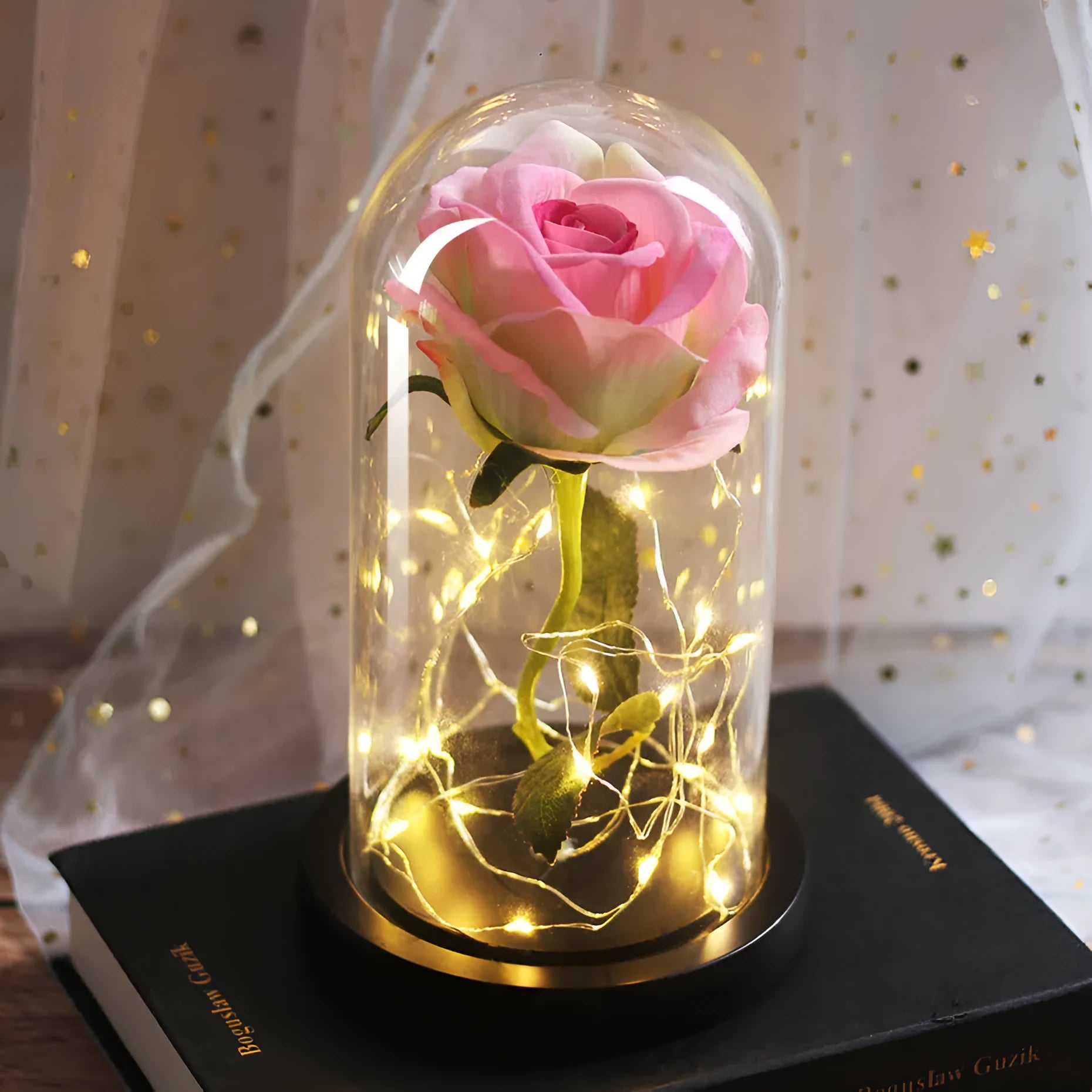 Silk rose bouquet with LED lights and glass shade in scarlet colour on wooden base