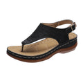 Women's casual wedge heel flip flop sandals with an adjustable buckle strap in black.