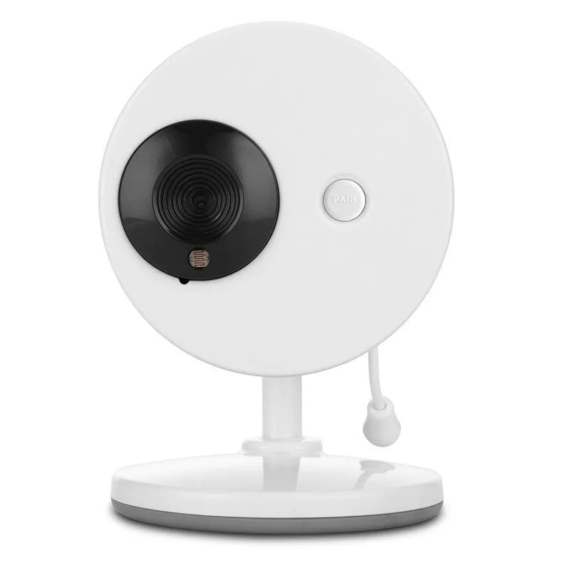 White wireless baby monitor with 3.5 inch screen and UFO-shaped camera unit on a table.