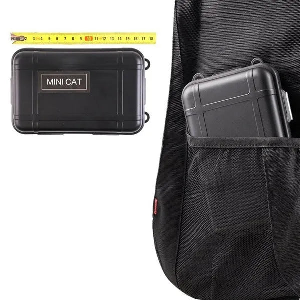Black stainless steel 13-piece survival treasure box kit with tools displayed beside shockproof storage case