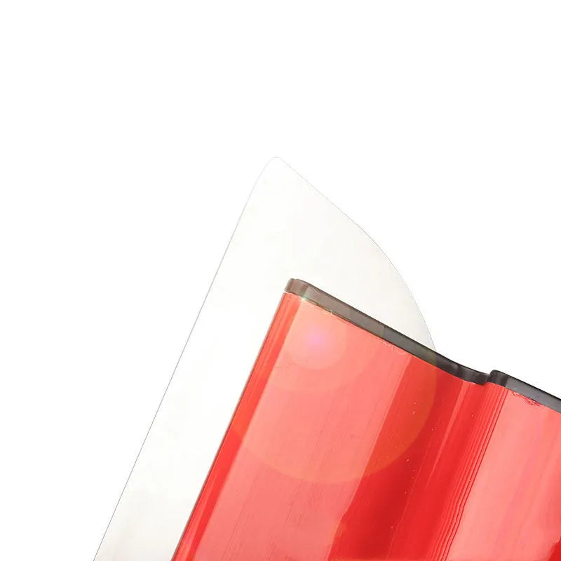 Red leveling scraper tool with a 40 cm wide steel blade for wall preparation