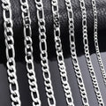 Silver stainless steel Figaro Cuba chain necklace on white background