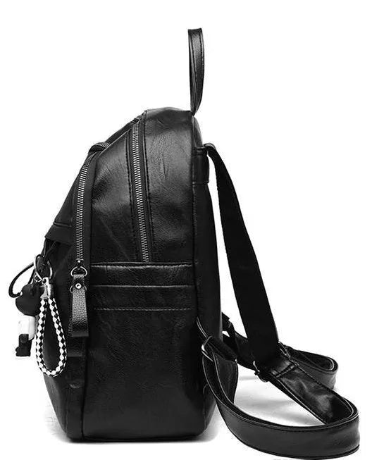 Black PU leather student backpack with double straps showing 20-35L capacity and organisational features