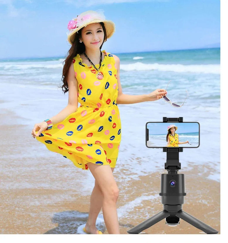 360-degree intelligent tracking pan tilt mobile phone bracket with AI face recognition on a table