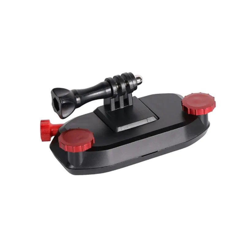 Blue and red plastic shoulder strap buckle clip for mounting sports cameras on backpacks.