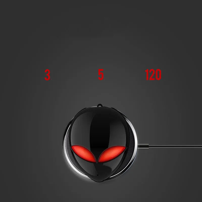 Alien-themed Creative Outer T8 Starman black wireless earbuds with red LED lights next to charging case.