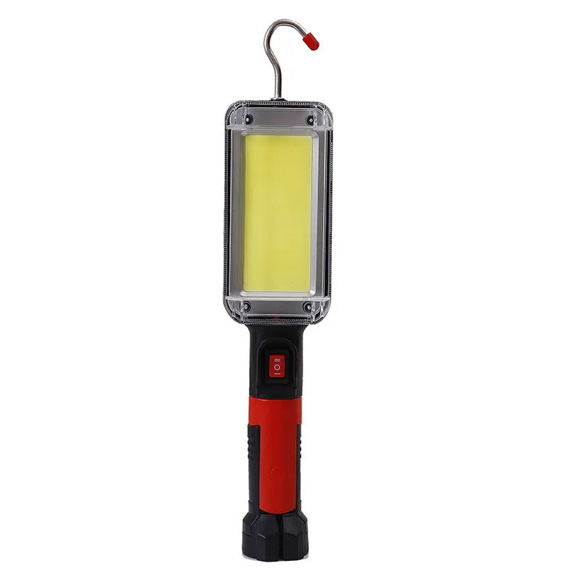 Red COB LED rechargeable flashlight with magnetic base, showing scale and USB cable.