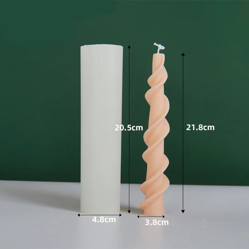 Silicone spiral lace rod candle mould for making decorative pillar candles.