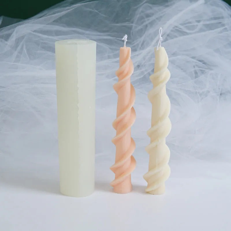 Silicone spiral lace rod candle mould for making decorative pillar candles.