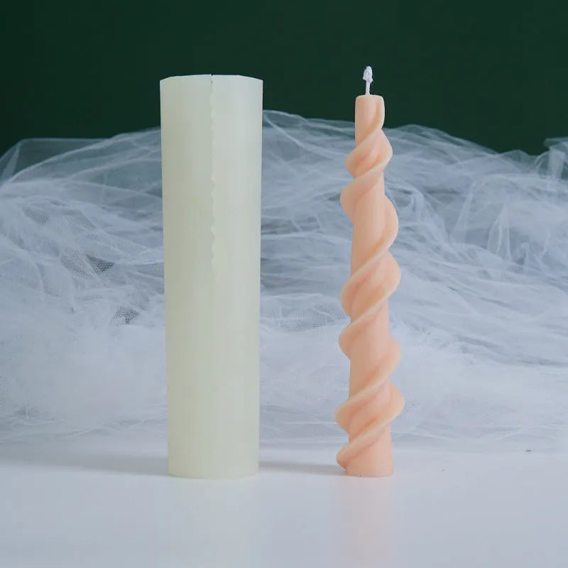 Silicone spiral lace rod candle mould for making decorative pillar candles.