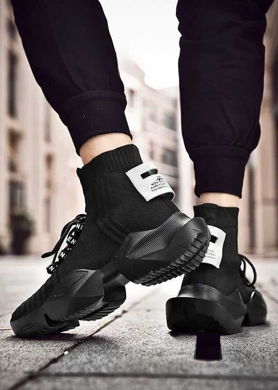 Men's black and white sports casual shoes with mesh lining available in sizes 39-47