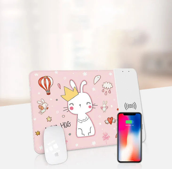 Cartoon pattern wireless charging mouse pad with RGB lighting showing smartphone charging on surface
