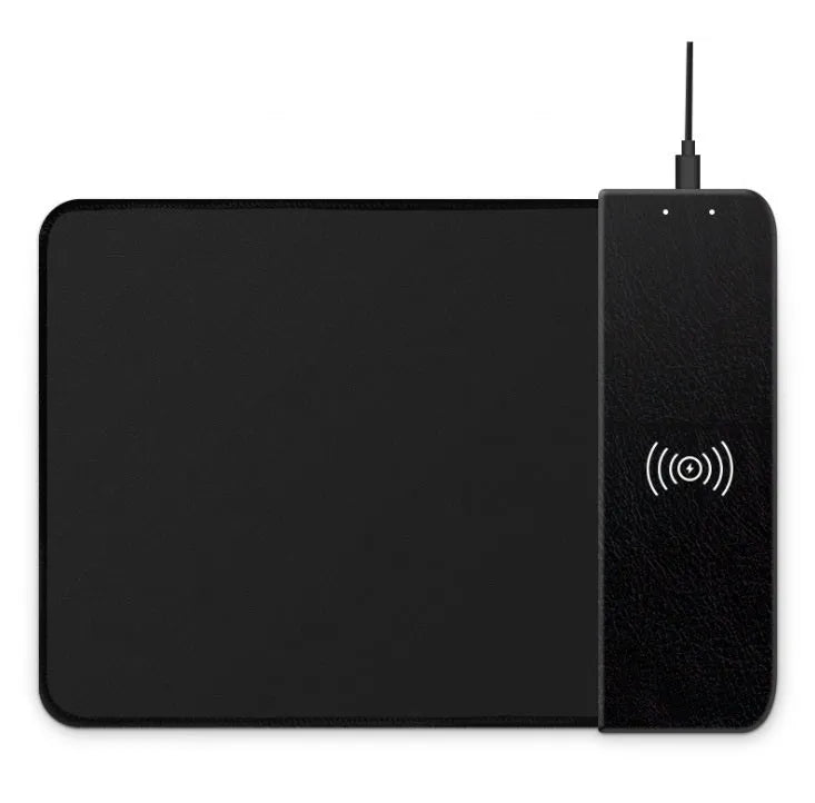 Cartoon pattern wireless charging mouse pad with RGB lighting showing smartphone charging on surface