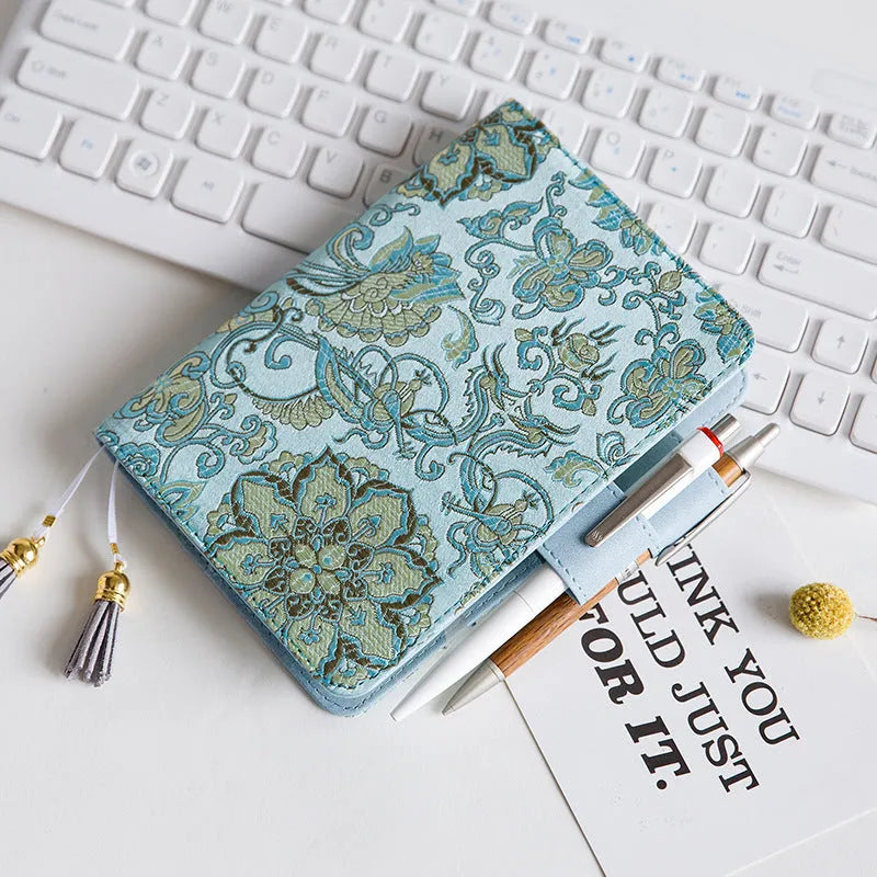 Flying blue flower fabric notebook in A5 size with 100gsm paper, cover showing floral pattern