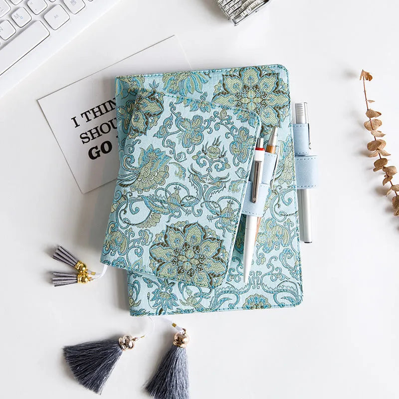 Flying blue flower fabric notebook in A5 size with 100gsm paper, cover showing floral pattern
