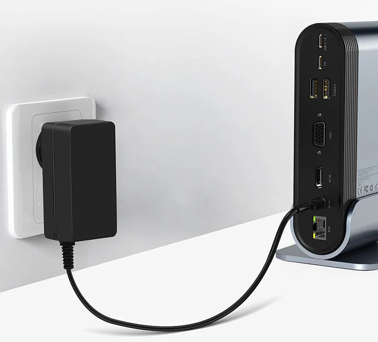 Deep space grey 16-in-1 Type-C docking station with external power supply on a desk.