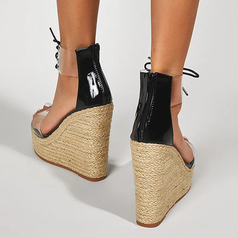 Black women's hemp rope wedge sandals with front tie closure and high wedge heel