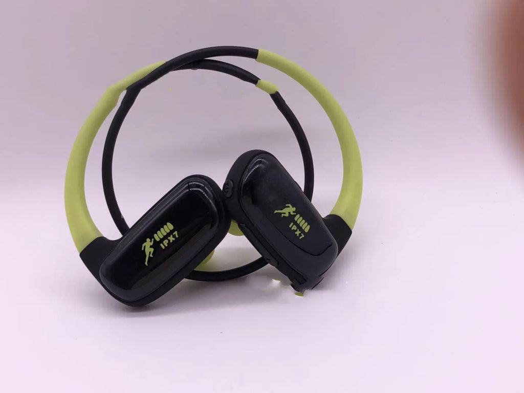 Wireless Bluetooth headset with bilateral earbuds, hanging ear design, 10m range, in black
