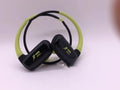 Wireless Bluetooth headset with bilateral earbuds, hanging ear design, 10m range, in black