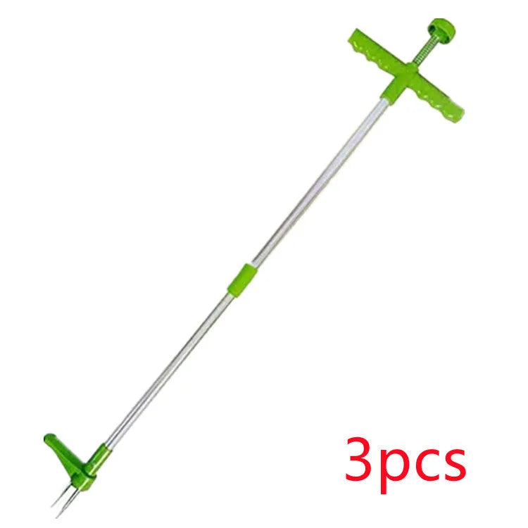 1046a manual garden weeding tool with aluminium handle on a soil background.