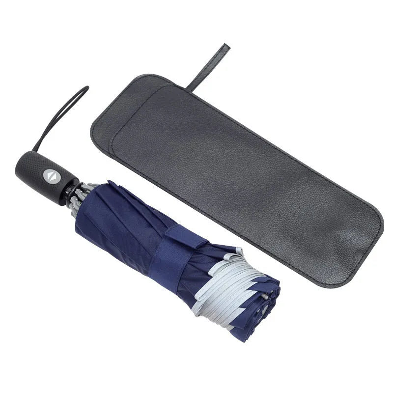 Black automatic reverse folding umbrella shown open, demonstrating its 10-rib canopy structure and plastic non-slip handle.