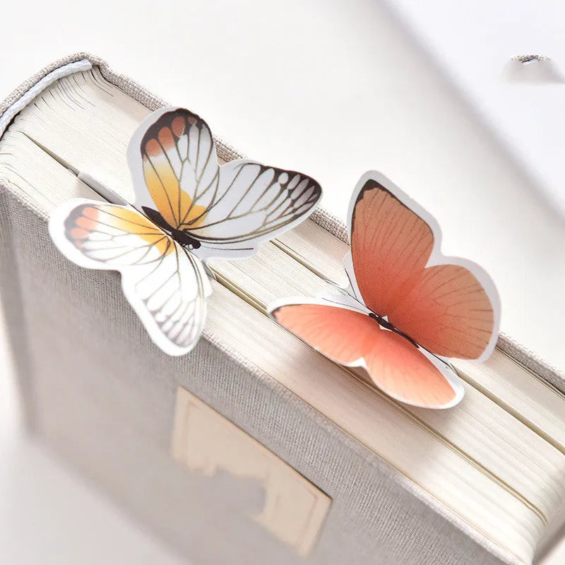 A single butterfly design paper bookmark with dimensions 13.5 cm by 5.5 cm.