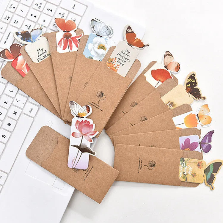 A single butterfly design paper bookmark with dimensions 13.5 cm by 5.5 cm.