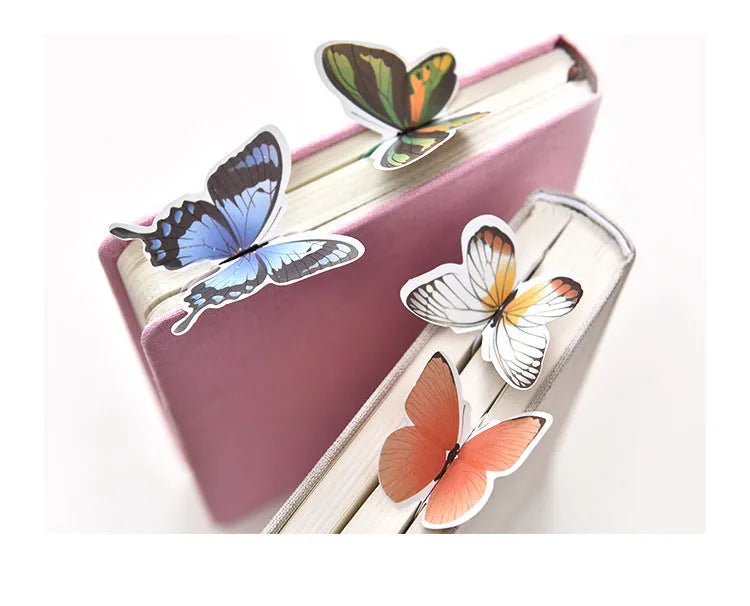 A single butterfly design paper bookmark with dimensions 13.5 cm by 5.5 cm.