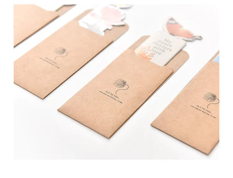A single butterfly design paper bookmark with dimensions 13.5 cm by 5.5 cm.