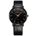Casual quartz wristwatch with alloy case, plexiglass lens, and mesh strap in black finish