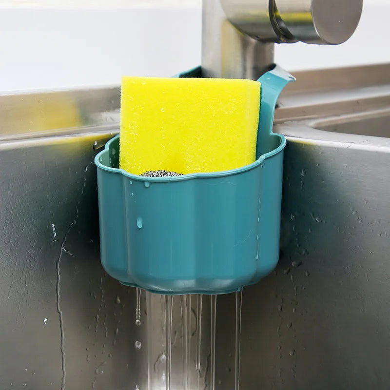 Plastic sink drain basket in Nordic style, shown in dark blue, measuring 20 cm long by 10 cm wide.