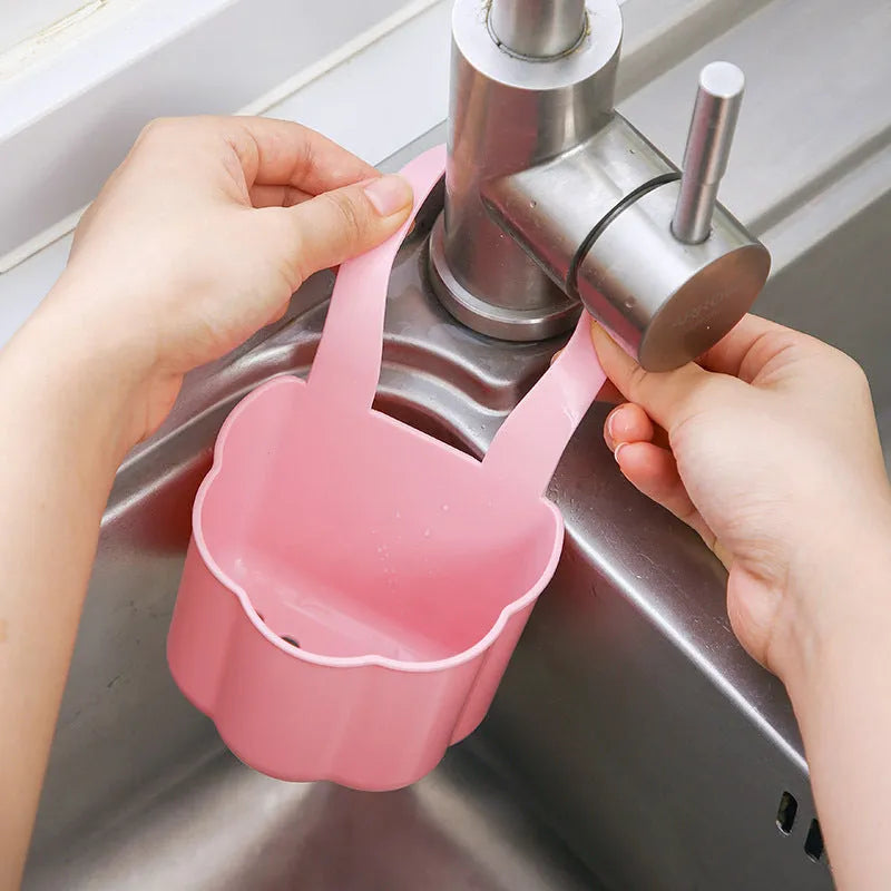 Plastic sink drain basket in Nordic style, shown in dark blue, measuring 20 cm long by 10 cm wide.