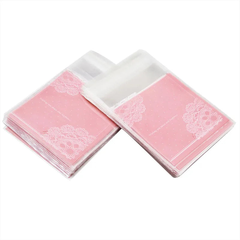 Pink self-adhesive plastic packaging bags for handmade soap, showing size and gusset