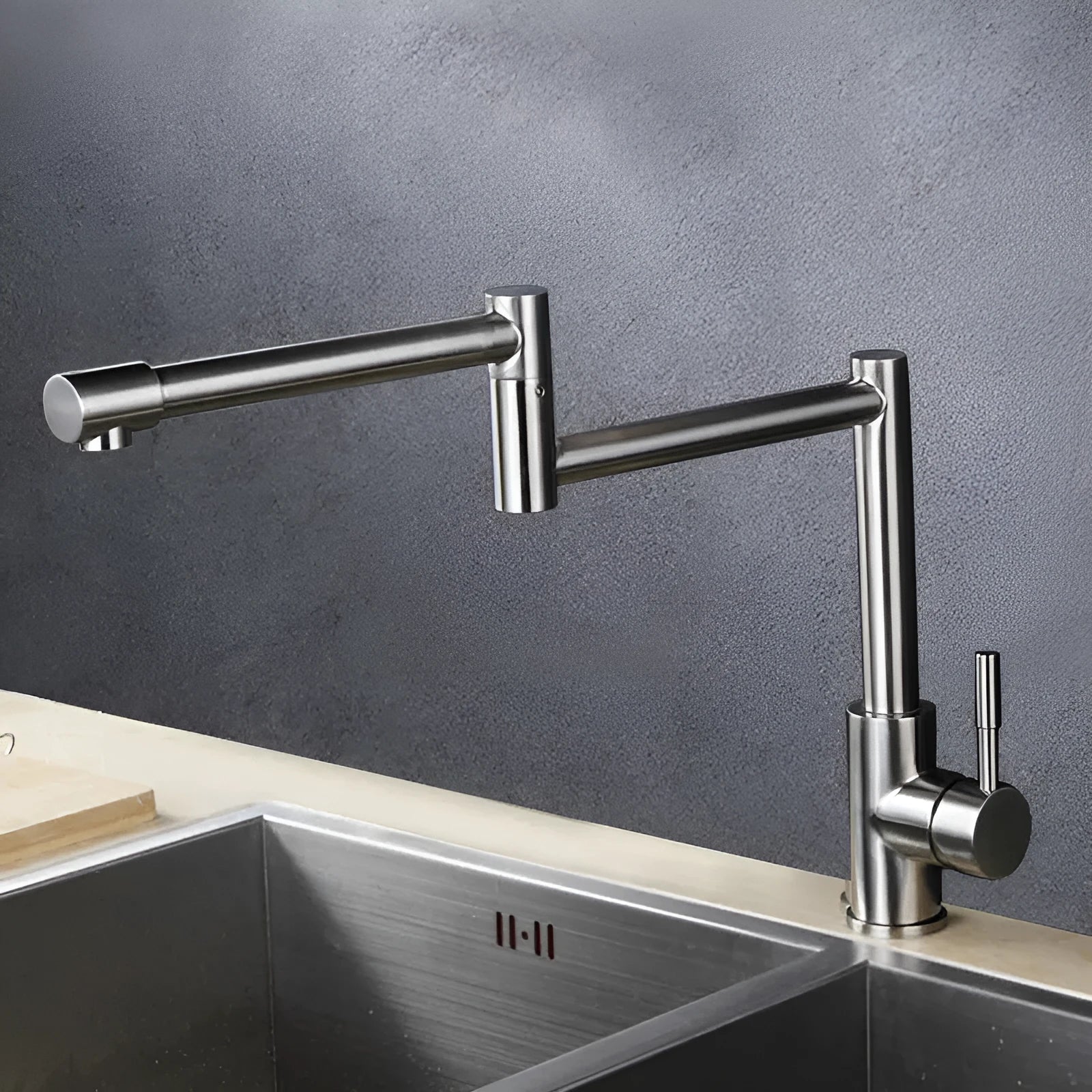 Silver stainless steel kitchen sink mixer tap with dual handles and 360-degree rotating spout