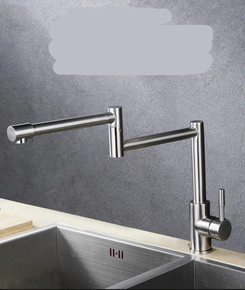 Silver stainless steel kitchen sink mixer tap with dual handles and 360-degree rotating spout