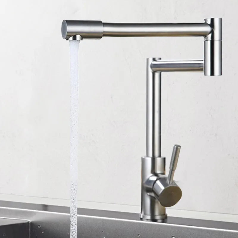 Silver stainless steel kitchen sink mixer tap with dual handles and 360-degree rotating spout