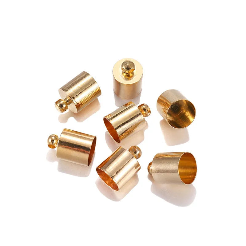 Assortment of small, shiny copper weight caps in various sizes and metallic colours for jewellery making.