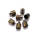 Assortment of small, shiny copper weight caps in various sizes and metallic colours for jewellery making.